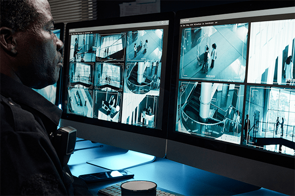 Man reviewing security camera footage