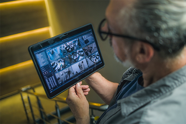 Man reviewing CCTV footage