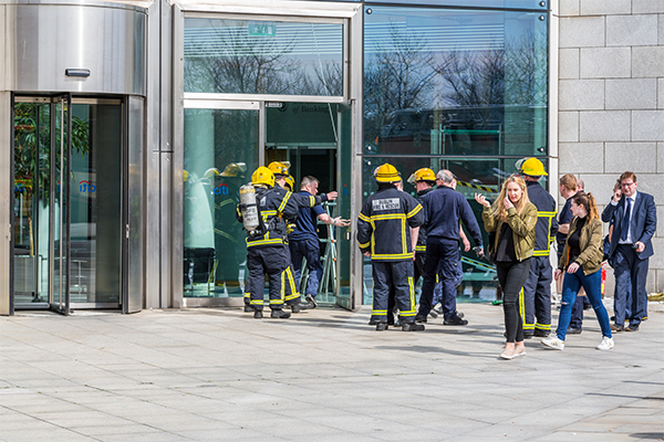 Employees evacuating a building
