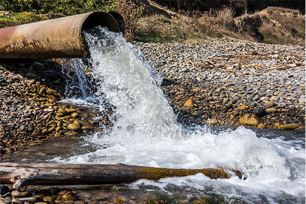 Water flowing out of a pipe